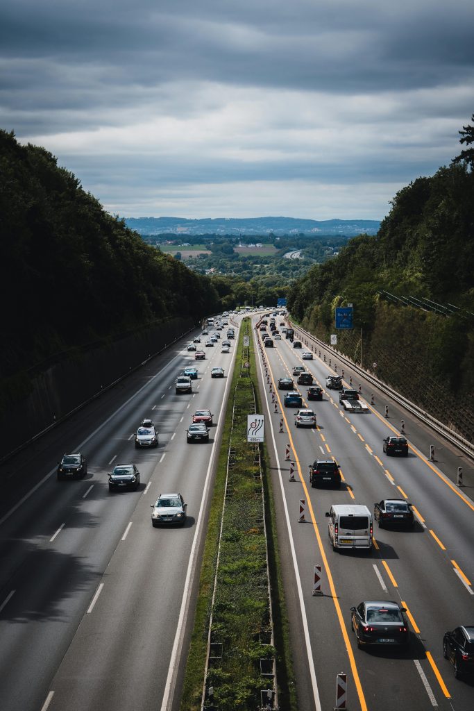 A scenic view of the bustling autobahn in Herford, Germany with cars in motion.